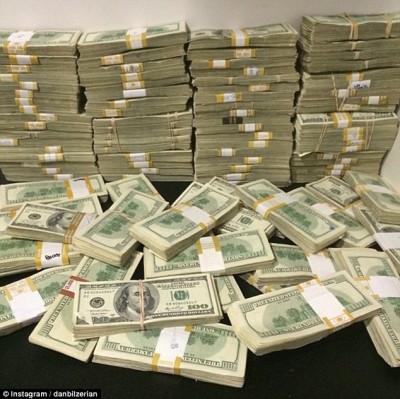 The playboy regularly posts pictures, like this, of piles of money